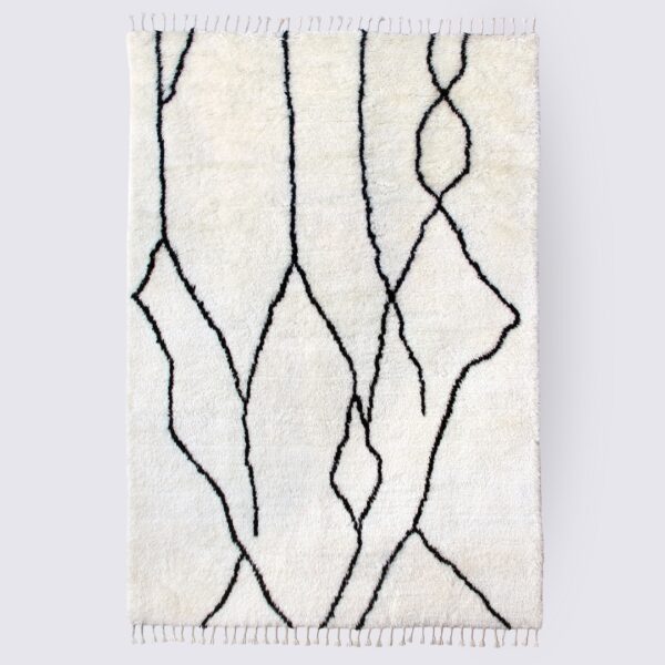 tapis berbère marocain noir et blanc fait main shaggy en laine nouvelle zelande 160x230cm amani